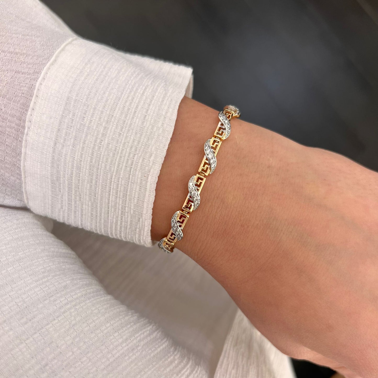 Armband mit rosè und silbernem Design